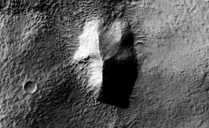 Bright Blue Object Captured on Mars: Pyramid