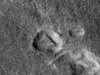 Triangular object inside crater on Mars
