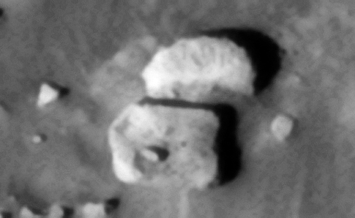 Similar artifact found on Mars: ESP_019094_2255 (click to view larger image at actual 1:1 scale)