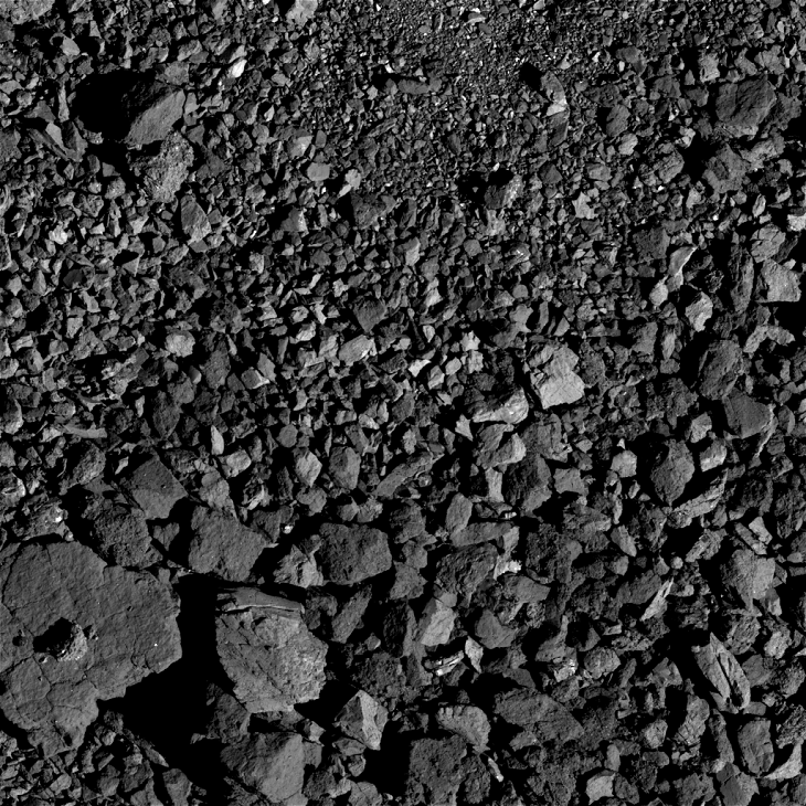 Bennu Asteroid: Large triangular object with small feature in its center - Click for original image at 1:1 scale