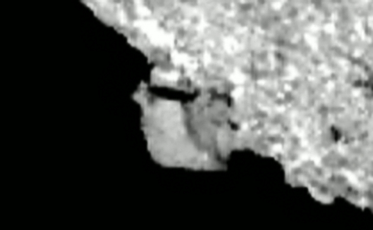 Side view of dolmen-type structure on Bennu (click to view larger image)