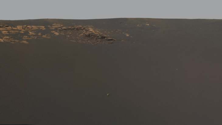 Cropped image showing the anomaly and some rocks  (click for image at original size)