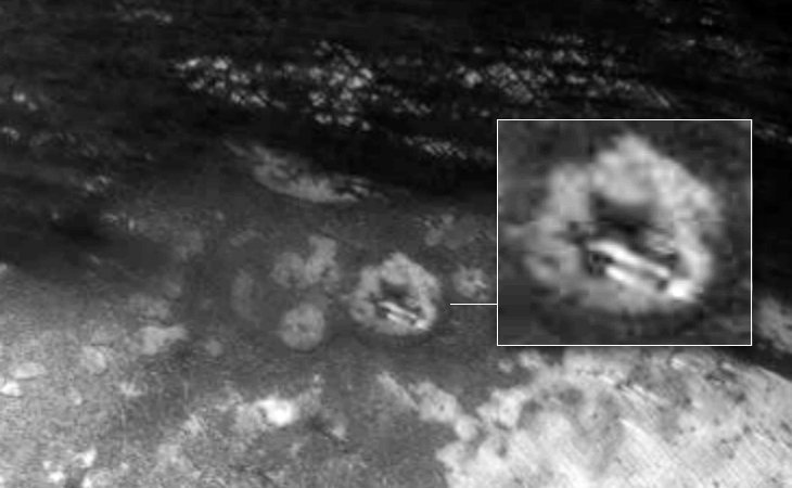 Two cigar shaped craft in Martian crater
