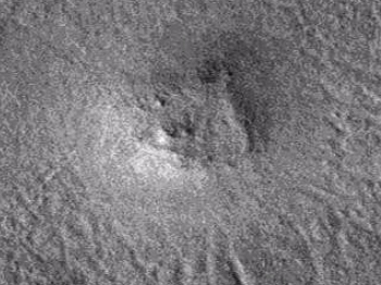 Large buried triangular object on Martian surface