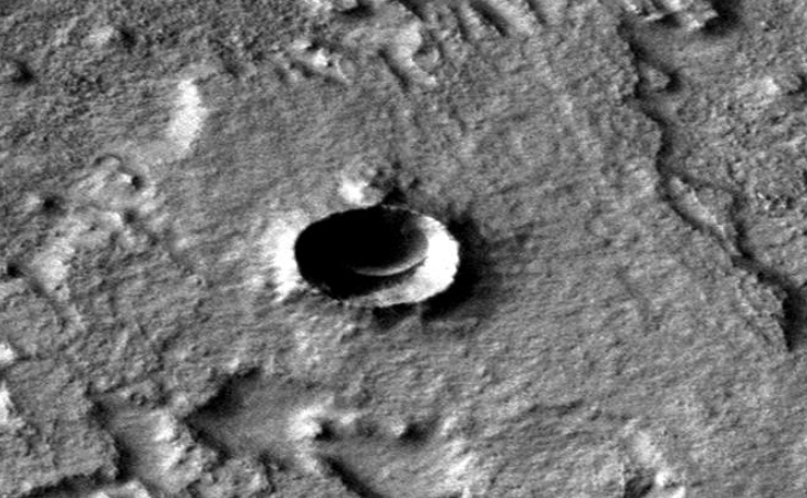 Disc-like craft inside Martian crater