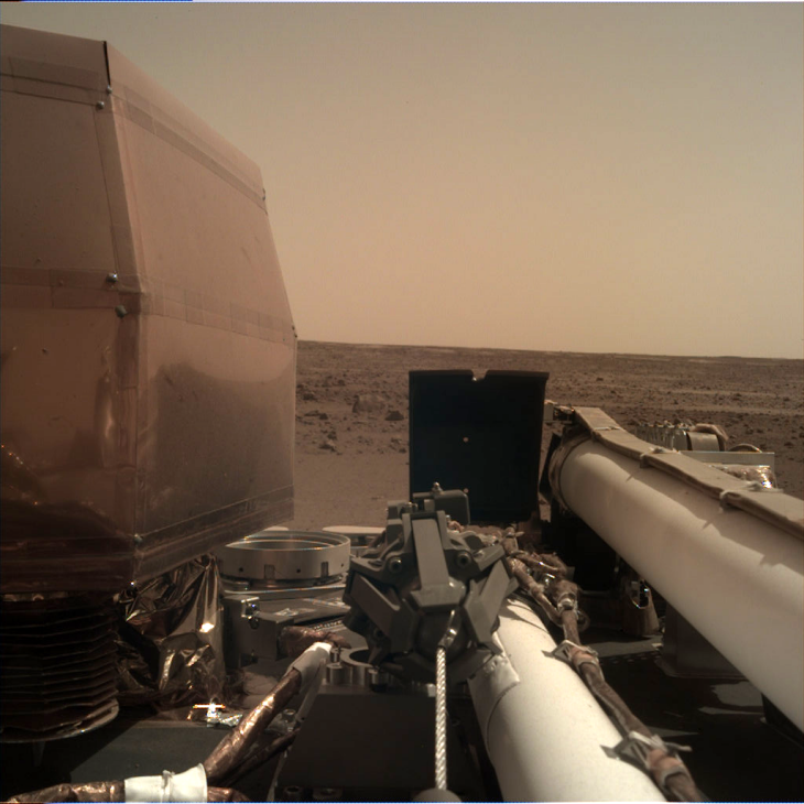 Sol 1: Instrument Deployment Camera (IDC), note the blue sky just vanished