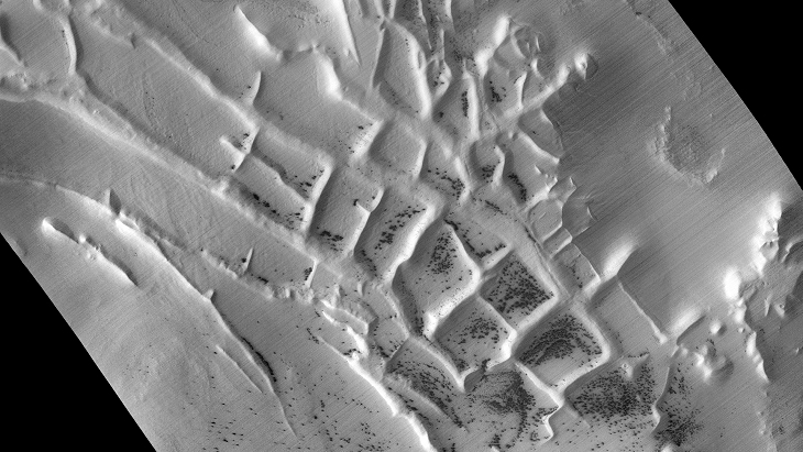 Ancient ruins, retaining walls or possible farming activity on Mars (D04_028911_0985_XN_81S064W)
