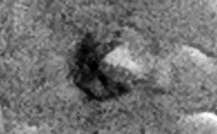 Another triangular area inside a crater/pit on Mars that appears to be machined leading to perhaps another underground entrance-way?