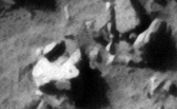 Note the object located to the middle top of the image that looks like a bent propeller