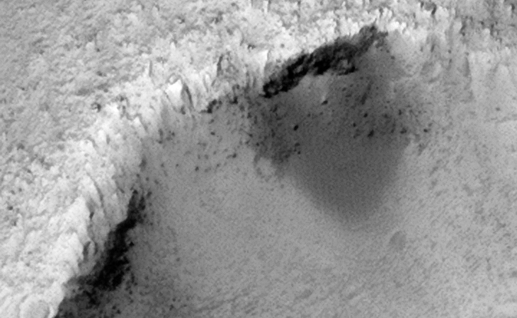Evidence of Liquid Flow or 'Other' Activity on Crater Wall?