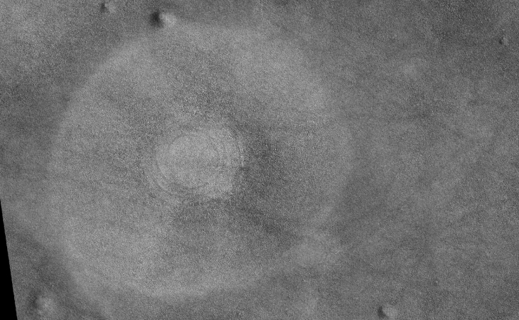 Large flat circular patch approximately 2500 metres in diameter